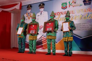 HUT Kabupaten Konawe Utara Ke-14 Tahun 2021 Bersama Kapolda Danrem 143/HO Terima Gelar Kehormatan