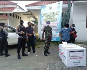 Tiba Di Morowali, Vaksin Sinovac Di Kawal Ketat TNI-Polri Sampai Di Gudang Farmasi.