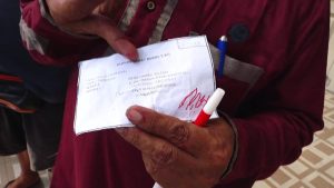 Penyaluran Zakat Fitrah Keluarga H. Muliadi ditemukan 2 kupon palsu hasil fotocopi